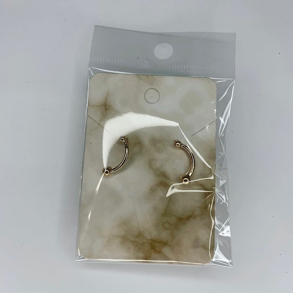 Gold curved earrings
